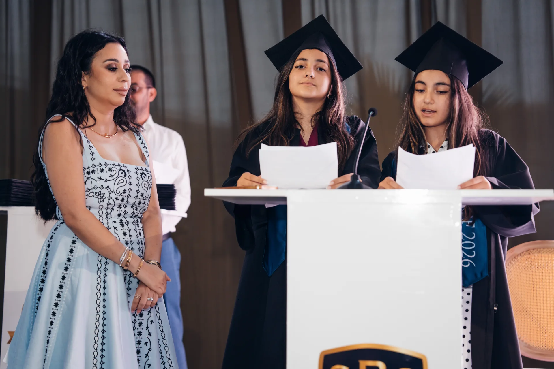 SBG Academy students presenting at graduation